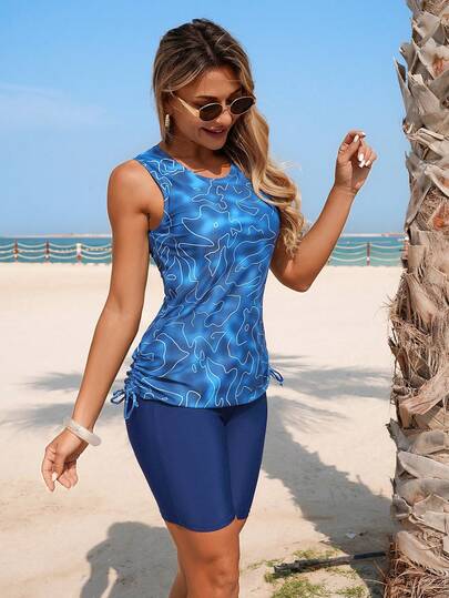 Swim Lushoire طقم سباحة كاجوال للنساء يتكون من كامسول برباط جانبي وشورت بطبعات متنوعة، مناسب للعطلات والشاطئ