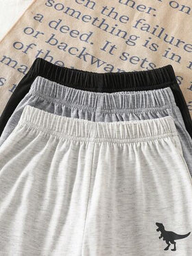 SHEIN Streecool Kids مجموعة 3 قطع من قميص كم قصير وبنطلون مطبوع عليه رسوم ديناصورات للأولاد الصغار باللون الأسود والرمادي والرمادي الفاتح، مناسبة للخروجات والملابس اليومية والرياضة والمناسبات