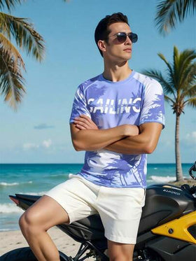 Manfinity Swimmode بدلة السباحة الواقية من الطبقات الجلدية للرجال ذات الطباعة الاستوائية