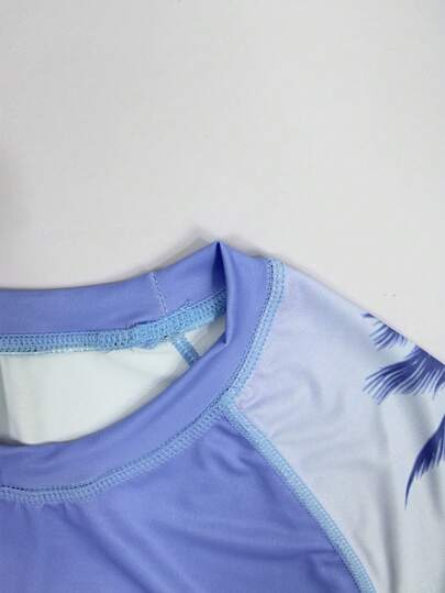 Manfinity Swimmode بدلة السباحة الواقية من الطبقات الجلدية للرجال ذات الطباعة الاستوائية