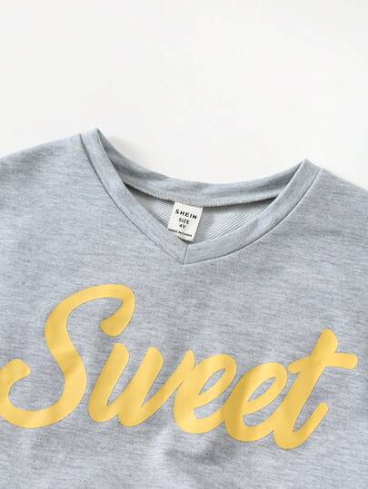 SHEIN مجموعة تي شيرت بياقة دائرية وبنطال مُحبوك من قطعتين، لون أحادي مع نمط حرفي، قياس فضفاض، مناسبة للارتداء في المنزل والخارج والمدرسة