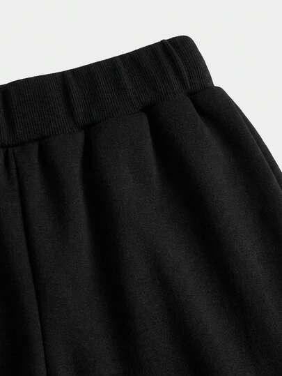 SHEIN بنطلون فتيات المراهقات ذو الخصر المنخفض واسع الساق باللون الأحادي