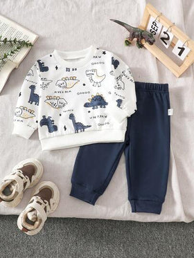 SHEIN Playful Pals مجموعة ملابس علوية بياقة مستديرة بطبعة ديناصور وبنطلون أخضر سادة للأطفال الصبيان، مناسبة للعب في الخارج والملابس الكاجوال والرياضية، للربيع والخريف