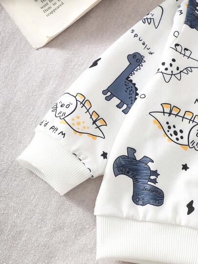 SHEIN Playful Pals مجموعة ملابس علوية بياقة مستديرة بطبعة ديناصور وبنطلون أخضر سادة للأطفال الصبيان، مناسبة للعب في الخارج والملابس الكاجوال والرياضية، للربيع والخريف