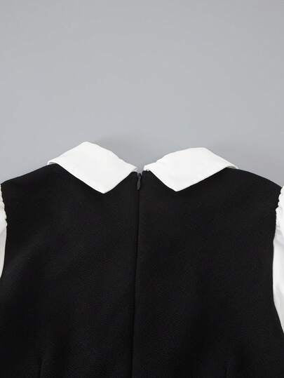 SHEIN هذه بدلة بقطعة واحدة مناسبة للفتيات المراهقات، تتميز بتصميم ياقة مرتفعة، أكمام طويلة، وزخارف أزرار على صفين. لها طراز واسع الساق مرتاح. مصنوعة من مزيج من الأقمشة السوداء والبيضاء. هذه البدلة مثالية للارتداء اليومي والتنقل في الحرم الجامعي، ومناسبة ل