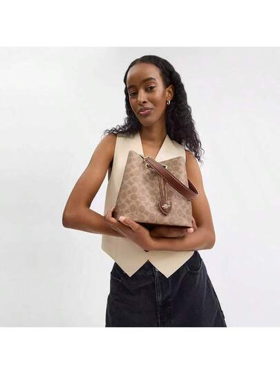 Coach حقيبة كتف هوبو أنيقة للنساء بمقبض