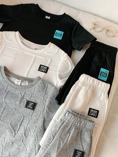 SHEIN 6 قطع مجموعة قميص كم قصير وشورت من قماش ملمس للأولاد، 2 قطعة/مجموعة، مناسبة للتنقل والمدرسة والأوقات الحرة اليومية والعطلات والسفر والرياضة، ملابس أطفال، بدلات مدرسية للأولاد، تناسب العائلة، حفلات عيد الميلاد، مناسبة لفصلي الربيع والصيف