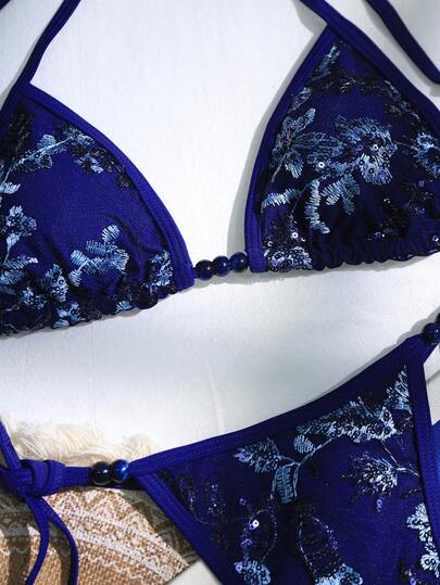 Swim SXY مجموعة بكيني مكونة من قطعتين مع سروال داخلي، مزينة بالترتر والتطريز والدانتيل، بتصميم عصري جريء مناسب لحفلات الشاطئ للنساء