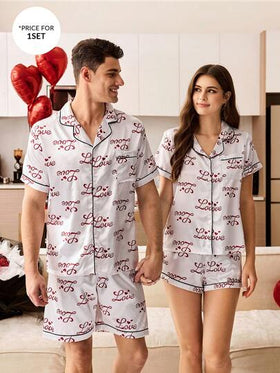 CoupledUp بيجامة رجالية من الساتان بأكمام قصيرة مطبوعة برسالة "الحب" وشكل قلب بألوان متباينة، مناسبة لعيد الحب