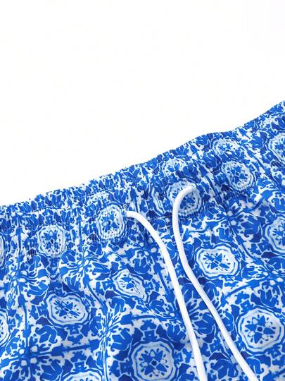 شورت شاطئ مطبوع بزهرة الكاجو مع رباط خصر، أسلوب صيفي عطلة للرجال، كاجوال رياضي سريع الجفاف، طراز هاواي الصيفي، عطلة شاطئ، ملابس سباحة للأزواج باللون الأزرق