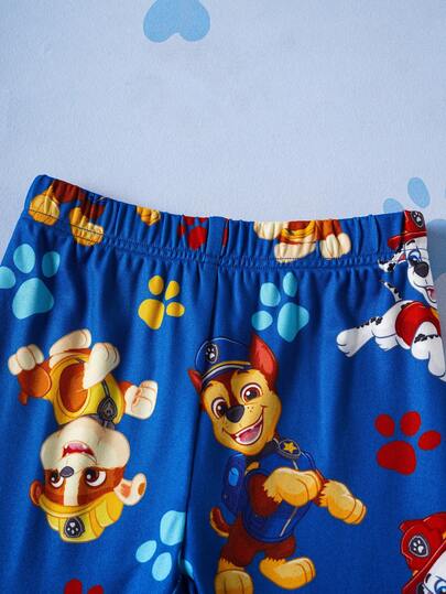 SHEIN | PAW Patrol طقم بيجامة مكون من ملابس علوية كم قصير وشورت بنمط كرتوني للأولاد، مصنوع من قماش مريح