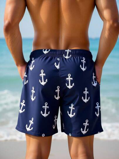 Manfinity Swimmode شورت شاطئ للرجال بخصر مرن مطبوع عليه رسم المرساة وجيوب