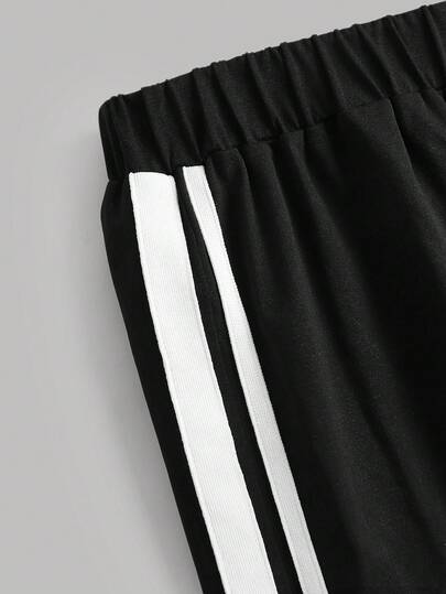 SHEIN مجموعة بنطلون وتي شيرت فضفاض بتصميم أبيض وأسود للبنات المراهقات، تي شيرت بياقة طاقم وأكمام قصيرة، بنطلون ساق واسعة، مناسب للمدرسة والرياضة