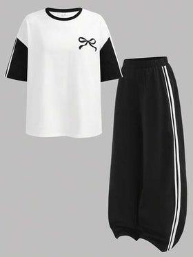 SHEIN مجموعة بنطلون وتي شيرت فضفاض بتصميم أبيض وأسود للبنات المراهقات، تي شيرت بياقة طاقم وأكمام قصيرة، بنطلون ساق واسعة، مناسب للمدرسة والرياضة
