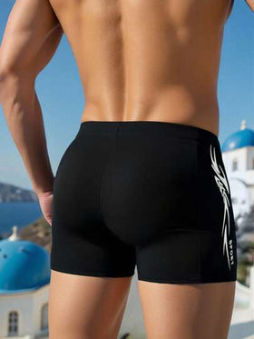 Manfinity Swimmode سراويل السباحة الكاجوال المطبوعة للرجال للعطلات الشاطئية
