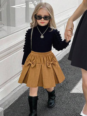 Elladie kids مجموعة من قطعتين للبنات الصغيرات: ملابس علوية سوداء بأكمام منتفخة + تنورة خاكي مخملية بفيونكة، طراز كاجوال وعتيق، مريحة، مناسبة للاستخدام اليومي والسفر والمدرسة والحفلات