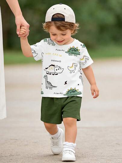 SHEIN Playful Pals مجموعة قميص وشورت مطبوع بطبعة ديناصور لطيفة للأطفال الرضع والأولاد من 0-3 سنوات، قطعتان، ملائم للربيع/الصيف، كاجوال، خارجي، أساسي، رياضي، عصري وبسيط