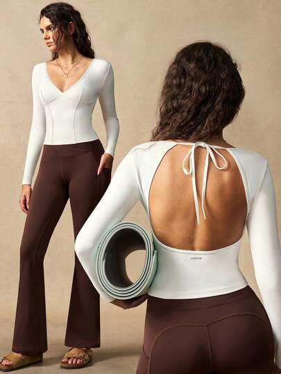 VARSIVA تي شيرت رياضي للنساء بتصميم ضيق وفتحة خلفية وياقة على شكل حرف V باللون الأحادي