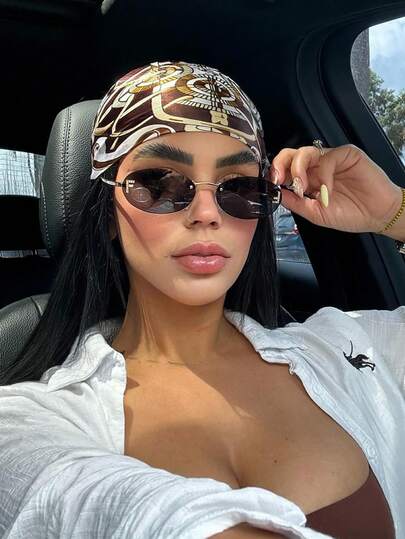 زوج من نظارات المرأة ذات الإطار المعدني البيج البيضاوي بدون إطار، مناسبة للارتداء اليومي