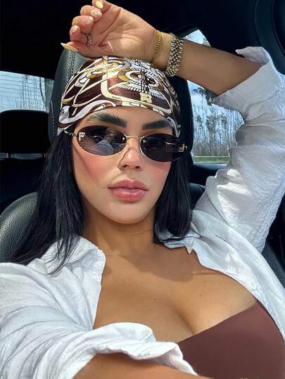 زوج من نظارات المرأة ذات الإطار المعدني البيج البيضاوي بدون إطار، مناسبة للارتداء اليومي