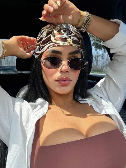زوج من نظارات المرأة ذات الإطار المعدني البيج البيضاوي بدون إطار، مناسبة للارتداء اليومي