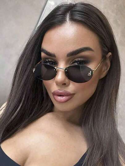 زوج من نظارات المرأة ذات الإطار المعدني البيج البيضاوي بدون إطار، مناسبة للارتداء اليومي