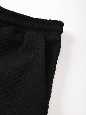 Manfinity Swimmode بدلة شاطئ مكونة من قميص أكمام قصيرة لون سادة وشورت للرجال كبار الحجم
