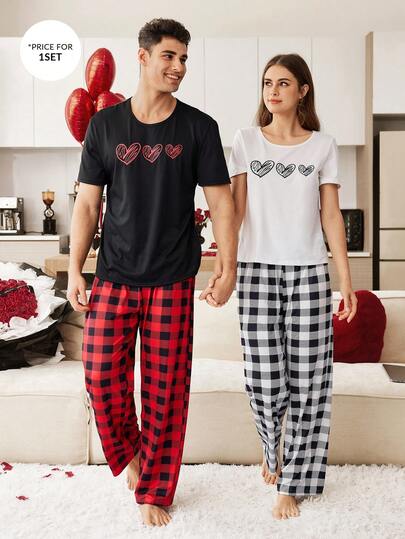CoupledUp طقم بيجامة رجالي كاجوال بتصميم قلب أسود على ملابس علوية كم قصير وبنطال مربعات أحمر وأسود