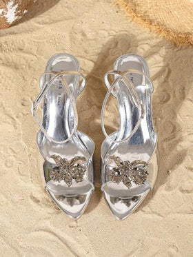 On feet& in love صنادل نسائية أنيقة ذات كعب عالي بتصميم زهري معدني مفتوحة الأصابع، مناسبة للارتداء مع الفساتين