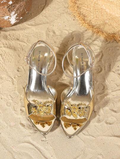 On feet& in love صندل نسائي أنيق ذو كعب عالي بتصميم معدني مزخرف بالزهور، مناسب للارتداء مع الفساتين