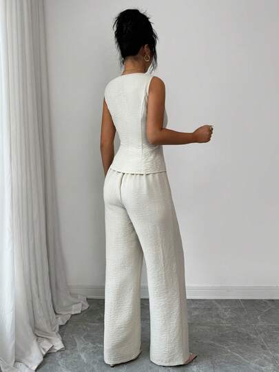 SHEIN Elenzya بدلة نسائية أنيقة بدون أكمام مزينة بإبزيم الحزام، تتكون من سترة وبنطلون، طراز عملي للمكتب، مناسبة للربيع/الصيف، ملابس المعلمة، ملابس المكتب، العودة إلى المدرسة، المواعيد، العطلات، التنقل، أنيقة، ملابس ربيعية عتيقة