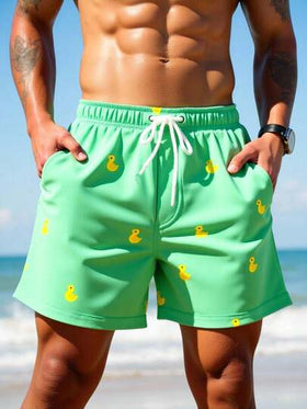 Manfinity Swimmode شورت شاطئ للرجال بخصر مرن مطبوع بطبعات كرتونية وجيوب مائلة