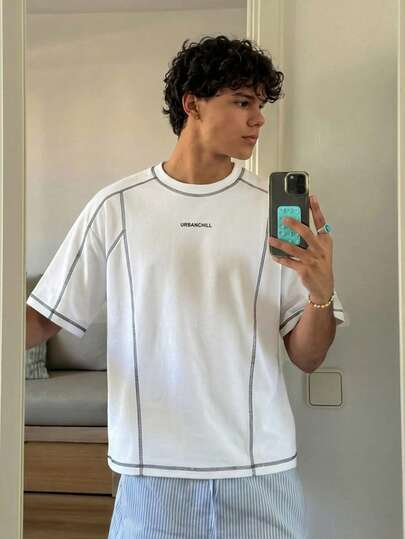Manfinity Unisex قميص تي شيرت كاجوال فضفاض بأكمام قصيرة مصنوع من الأقمشة المحبوكة، مناسب للاستخدام اليومي والشباب، صيفي، للأزواج