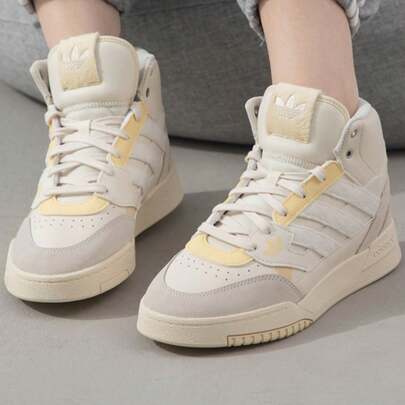 Adidas حذاء رياضي للجنسين من أديداس، بتصميم متوسط الارتفاع
