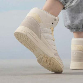 Adidas حذاء رياضي للجنسين من أديداس، بتصميم متوسط الارتفاع