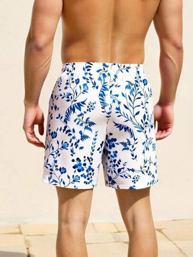 Manfinity Swimmode شورت كاجوال متعدد الاستخدامات للشاطئ مع خصر رباط مطبوع بنقشة الزهور للرجال