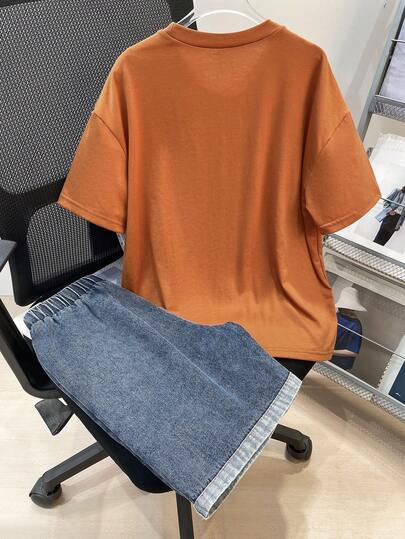 SHEIN مجموعة قميص كنزة بأكمام قصيرة وشورت جينز مريحة وعملية للأولاد/المراهقين، بطباعة حرفية ورسومية، مناسبة للتنقل والمدرسة والاستخدام اليومي والرياضة والربيع/الصيف والعطلات، قطعتان