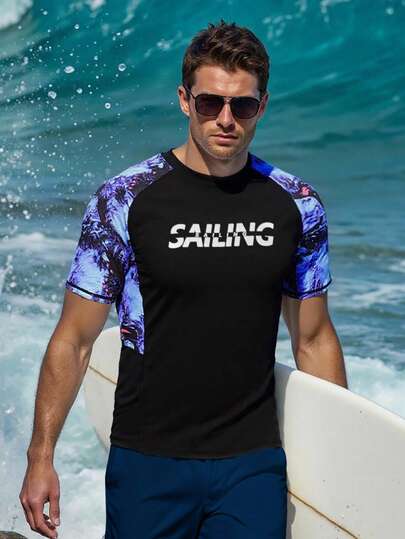 Manfinity Swimmode ملابس السباحة المطبوعة بطبعة استوائية للرجال، للشاطئ والتزحلق على الأمواج