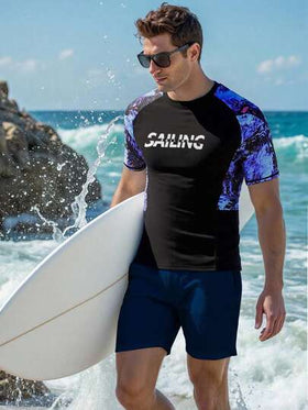 Manfinity Swimmode ملابس السباحة المطبوعة بطبعة استوائية للرجال، للشاطئ والتزحلق على الأمواج