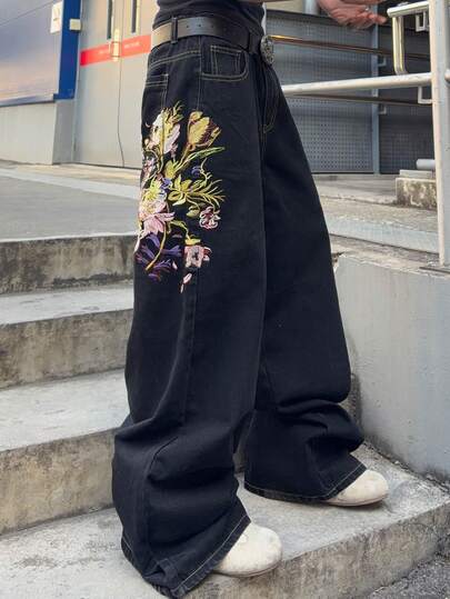 ROMWE MEN بنطلون جينز رجالي فضفاض بساق واسعة مطرز بزخارف زهرية على الجيب