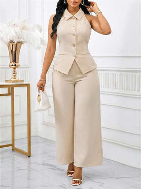 SHEIN Lady بدلة نسائية تتكون من ملابس علوية بدون أكمام ذات أزرار أمامية وبنطال واسع الساق بلون واحد