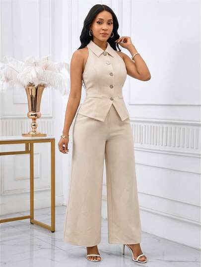 SHEIN Lady بدلة نسائية تتكون من ملابس علوية بدون أكمام ذات أزرار أمامية وبنطال واسع الساق بلون واحد