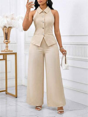 SHEIN Lady بدلة نسائية تتكون من ملابس علوية بدون أكمام ذات أزرار أمامية وبنطال واسع الساق بلون واحد