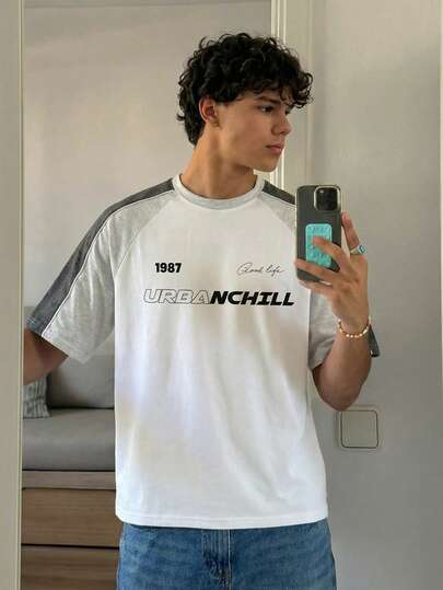 Manfinity Unisex قميص تي شيرت كاجوال قصير الأكمام مطبوع بطريقة الرقع للرجال، مناسب للصيف والمدرسة والخريف، بتصميم فضفاض وعصري