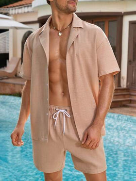 Manfinity Swimmode بدلة شاطئ للرجال مكونة من ملابس علوية أكمام قصيرة أزرار أمامية وشورت لون سادة