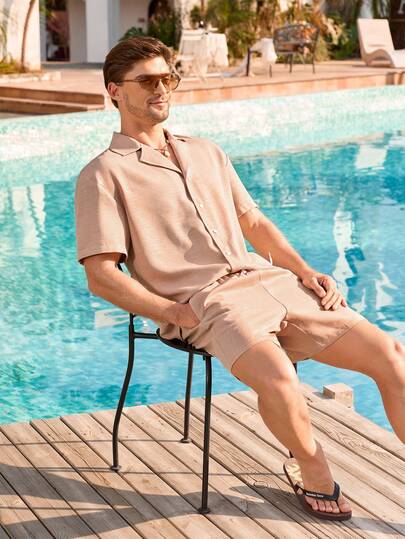 Manfinity Swimmode بدلة شاطئ للرجال مكونة من ملابس علوية أكمام قصيرة أزرار أمامية وشورت لون سادة