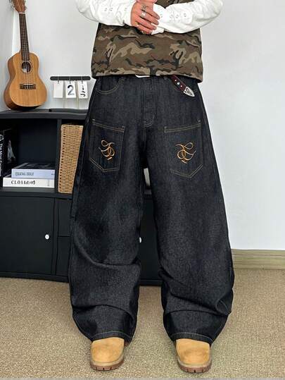 STEELVANCE بنطلون جينز فضفاض بتصميم نمط الجناح المطرز بطراز الشارع الكلاسيكي، تصميم نيش بسيط وعصري، ساق مستقيمة وواسعة