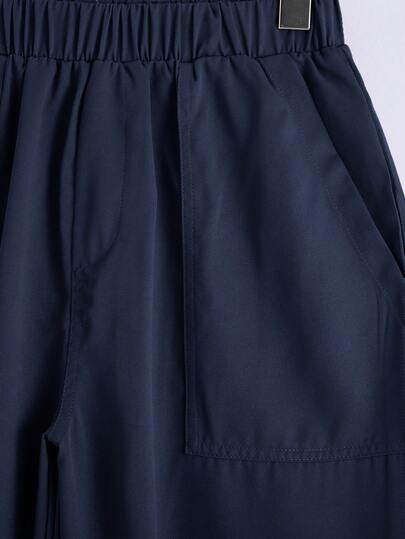 SHEIN مجموعة ملابس علوية وبنطلون قصير بأكمام قصيرة للمراهقين الذكور، مريحة وعملية بألوان متباينة، قطعتان