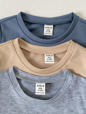 SHEIN 6 قطع طقم بنطلون وتي شيرت قصير الأكمام للأطفال الصبيان، لون سادة بطبعة حرفية بارزة، خصر مطاطي، متعدد القطع للتنسيق الكامل