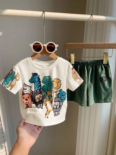 SHEIN مجموعة ملابس علوية وشورت كاجوال للأطفال الرضع بنات/أولاد بطبعات حيوانات بألوان الكريون، فضفاضة بياقة مستديرة، مناسبة للارتداء في الربيع والصيف، قطعتان/مجموعة